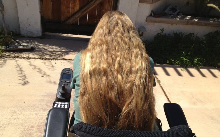 Having long hair symbolizes my right to make choices about my life as a person with a disability.