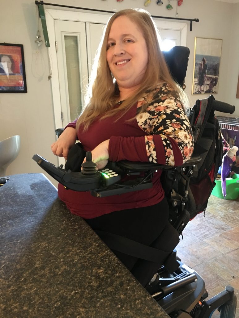 At the kitchen counter in my Permobil F5 VS standing wheelchair.