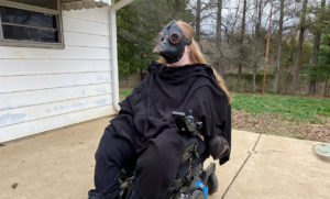 Karin wearing a plague doctor mask.